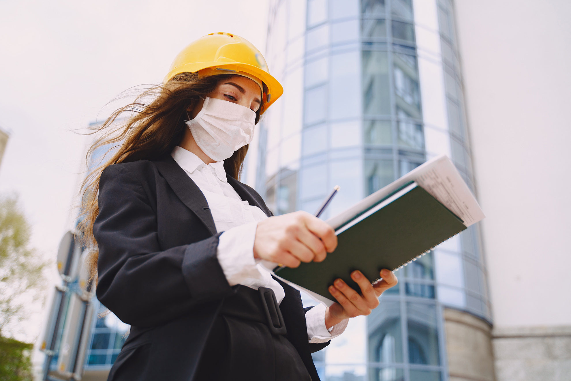 female-architect-with-construction-site